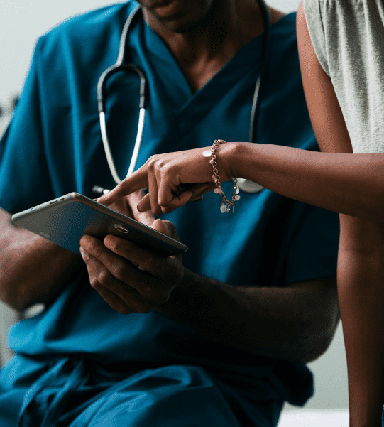 A Noom clinician reviewing data on a phone.
